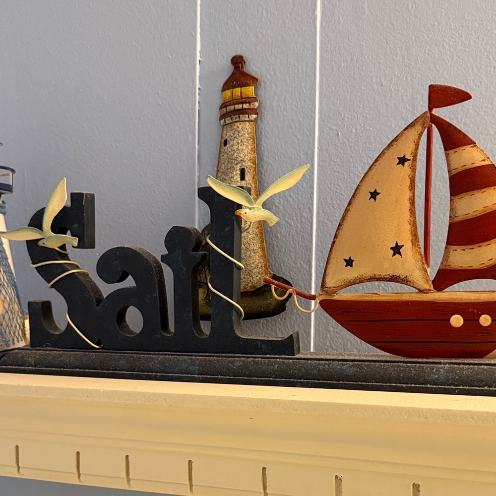 Nautical Decor with Sailboat and Lighthouse